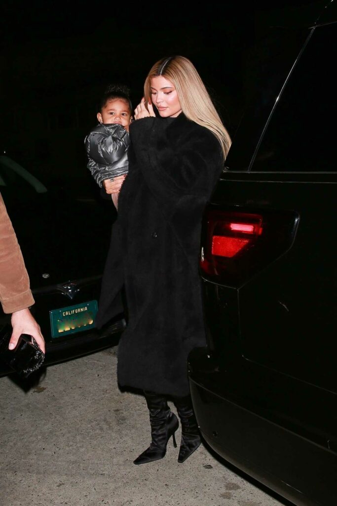 Kylie Jenner in a Black Fur Coat