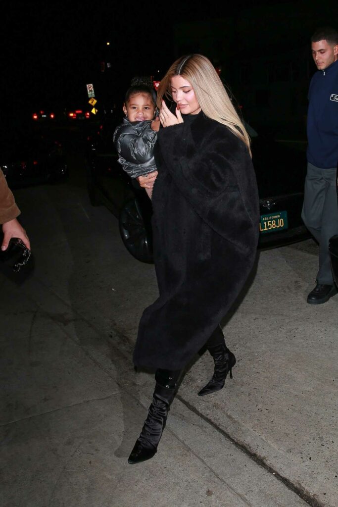 Kylie Jenner in a Black Fur Coat
