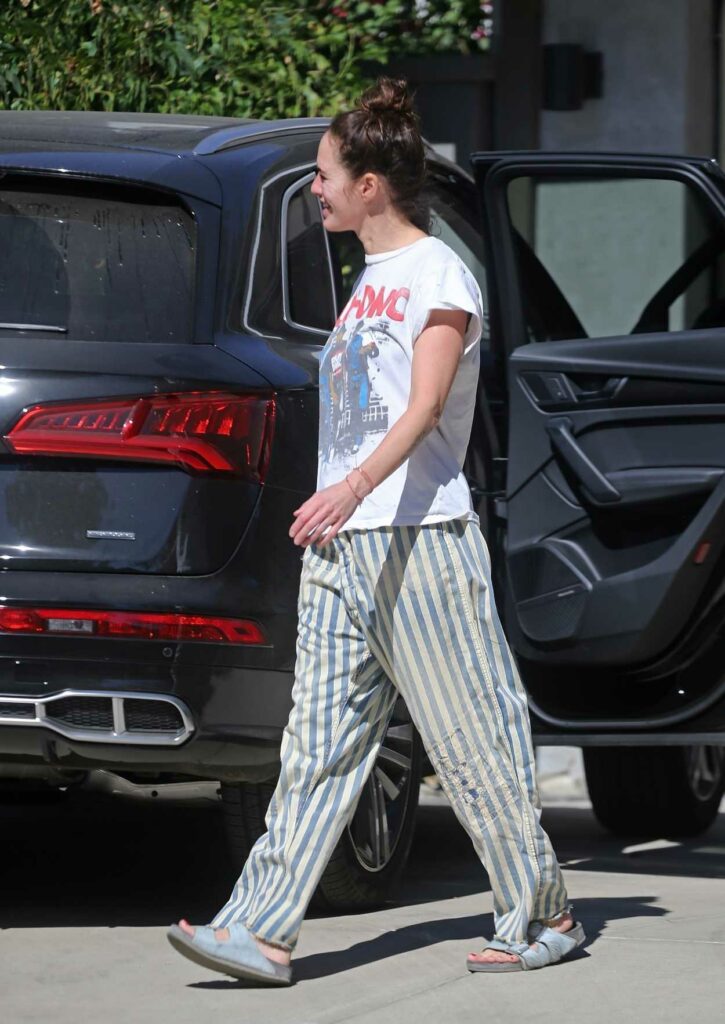 Lena Headey in a Striped Pants