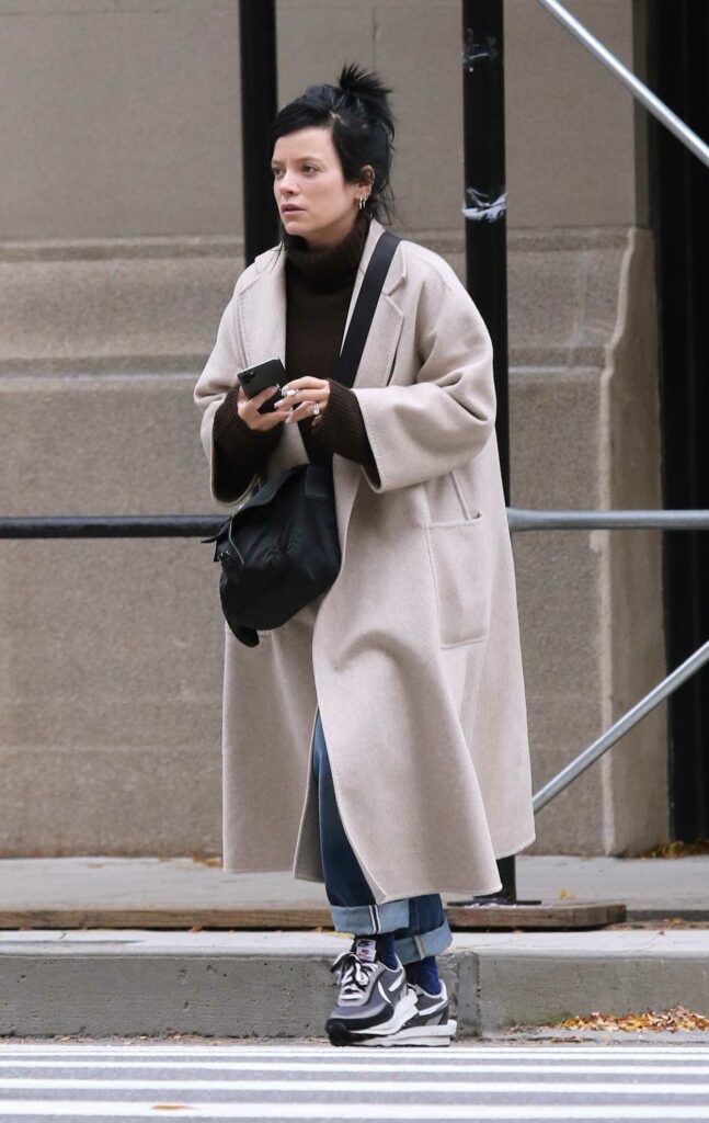 Lily Allen in a Beige Coat
