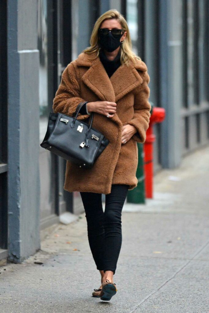 Nicky Hilton in a Tan Faux Fur Coat