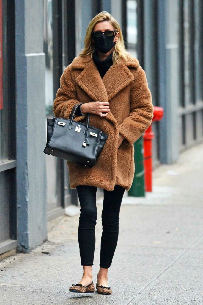 Nicky Hilton in a Tan Faux Fur Coat