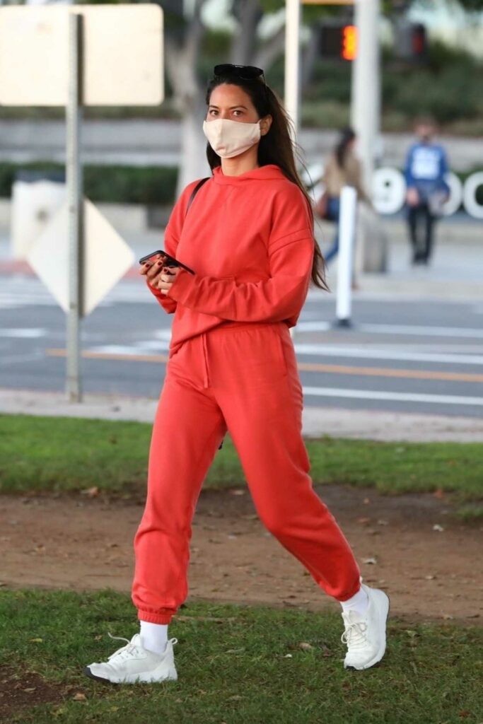 Olivia Munn in a Red Sweatsuit