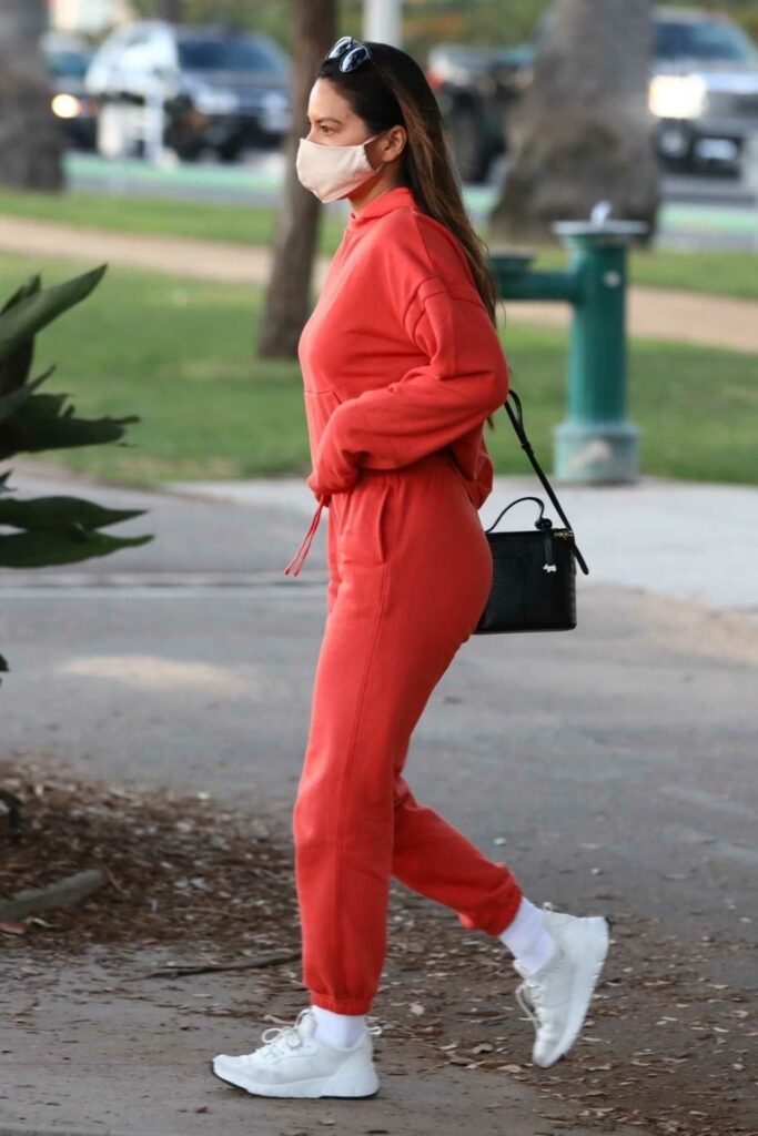 Olivia Munn in a Red Sweatsuit