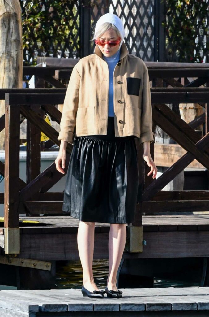 Pom Klementieff in a Black Skirt