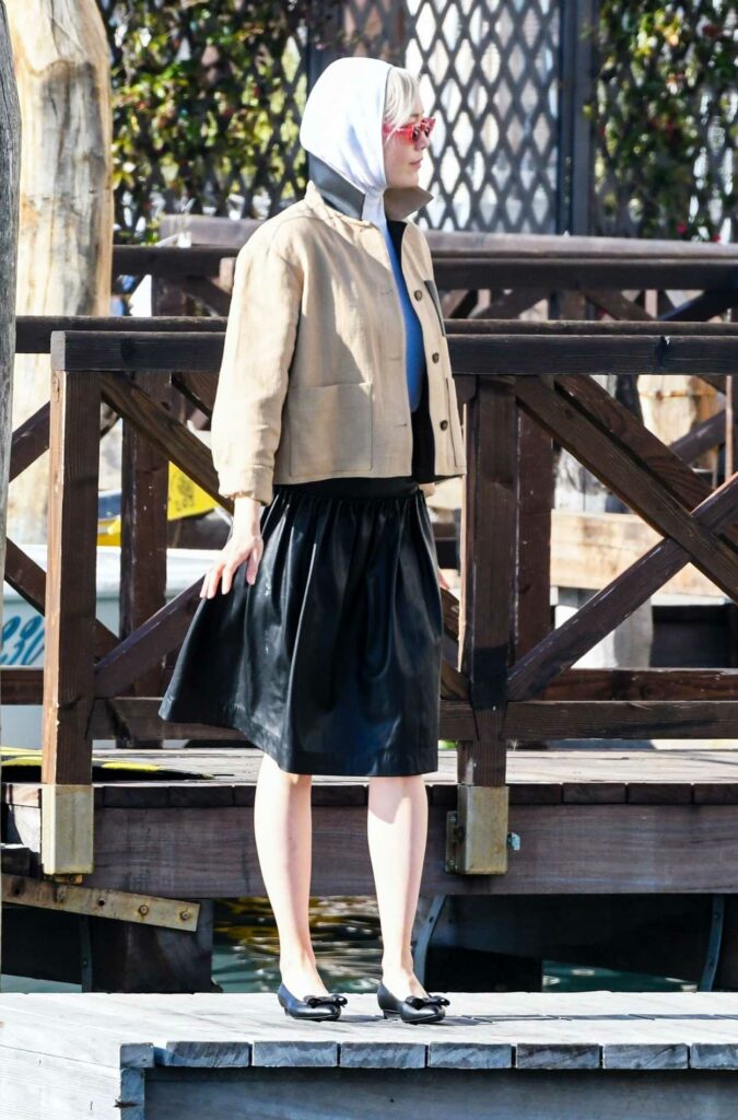 Pom Klementieff in a Black Skirt