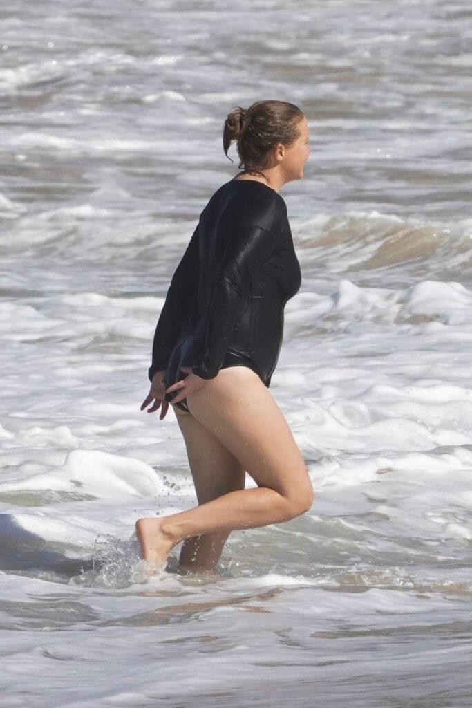 Amy Schumer in a Black Swimsuit