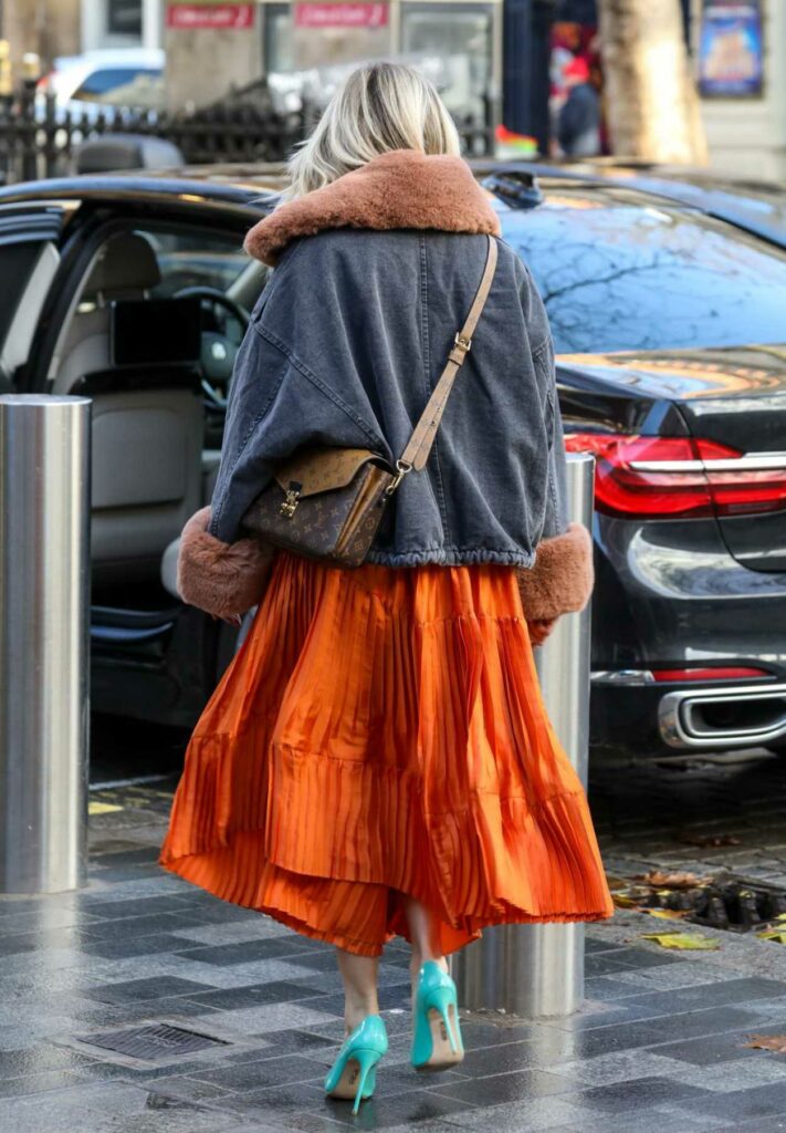 Ashley Roberts in an Orange Dress