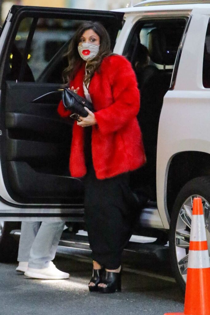 Bethenny Frankel in a Red Fur Jacket