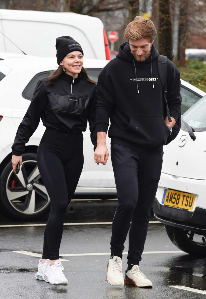 Faye Brookes in a Black Knit Hat