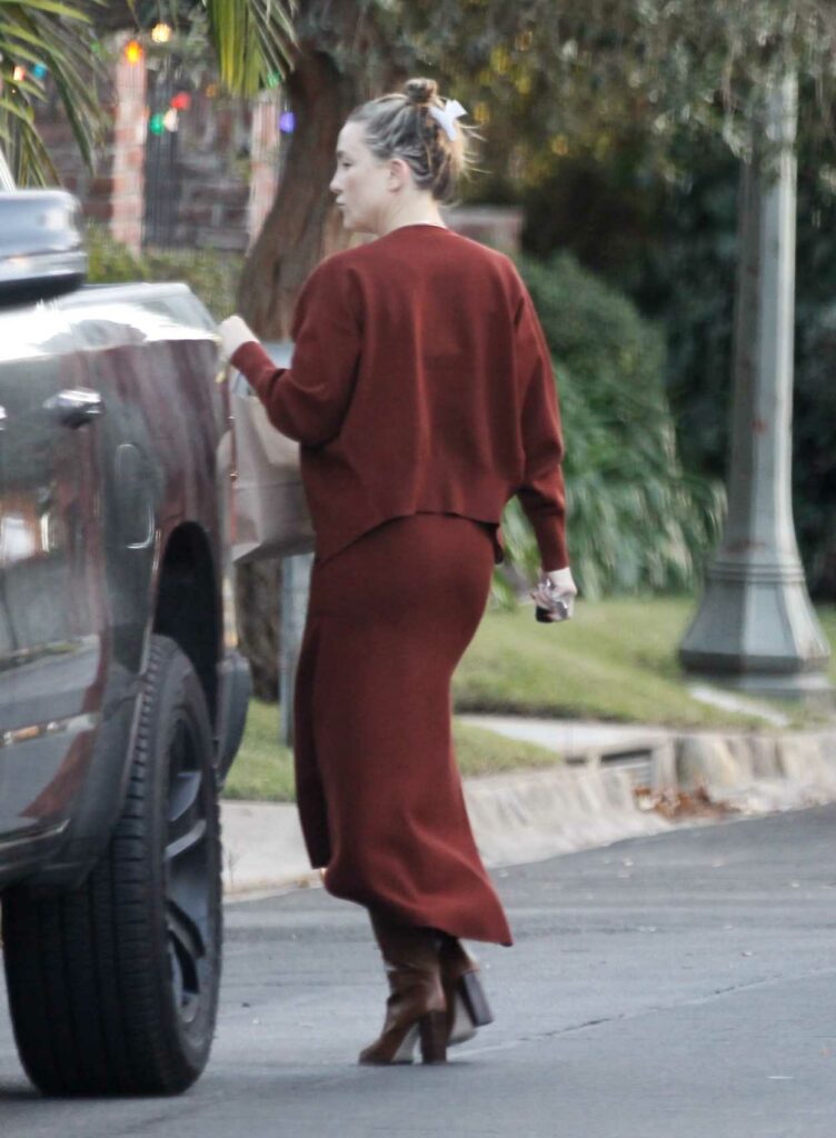 Kate Hudson in a Red Suit