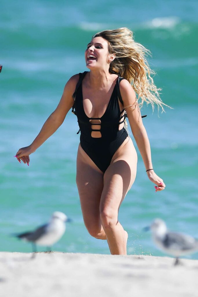 Lele Pons in a Black Swimsuit