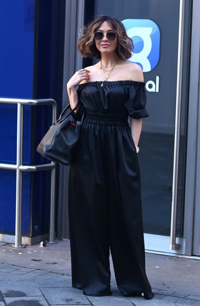 Myleene Klass in a Black Outfit