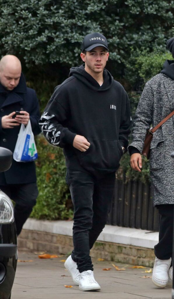 Nick Jonas in a Black Hoodie