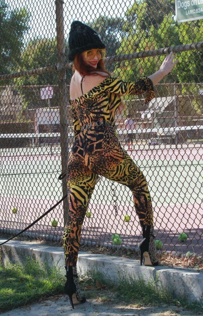 Phoebe Price in an Animal Print Catsuit