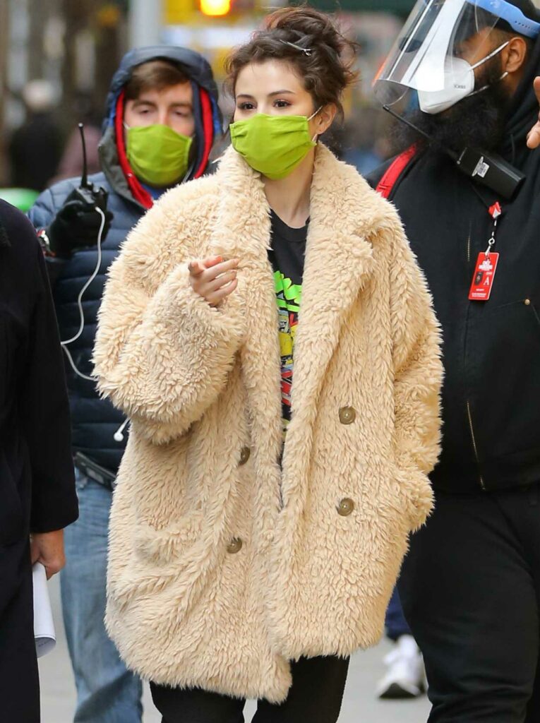 Selena Gomez in a Green Protective Mask
