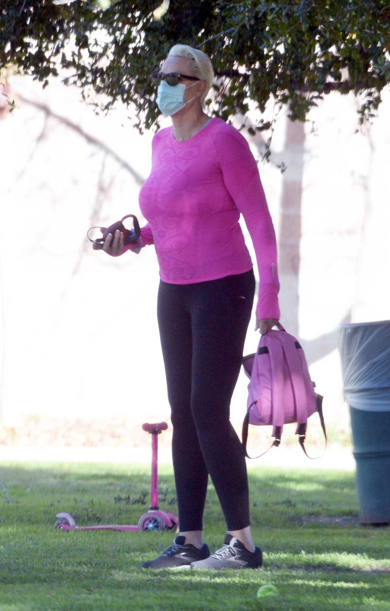 Brigitte Nielsen in a Purple Sweatshirt Walks Her Dog at the Park in ...