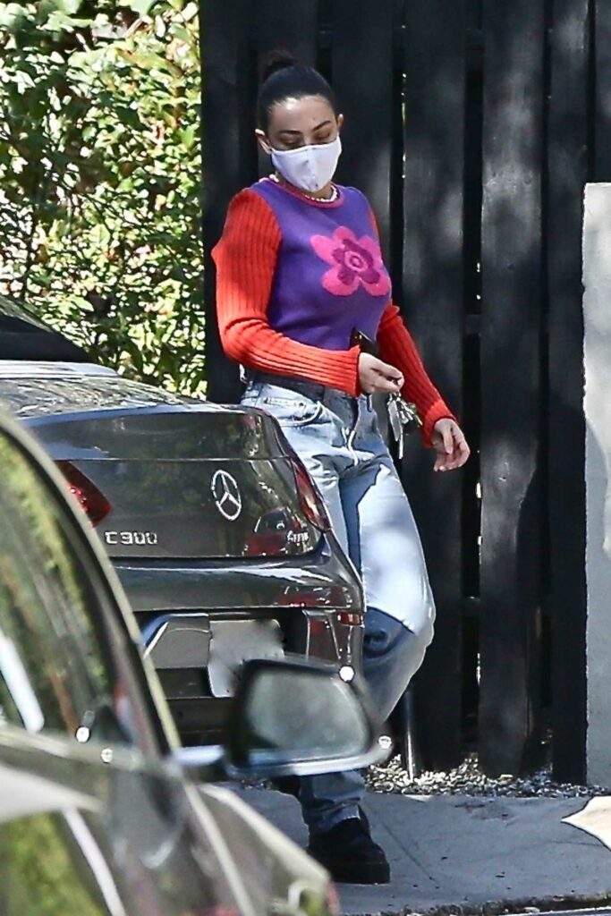 Charli XCX in a Protective Mask