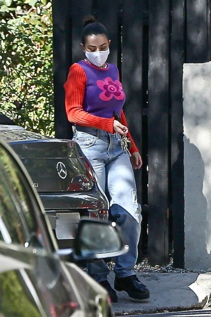 Charli XCX in a Protective Mask