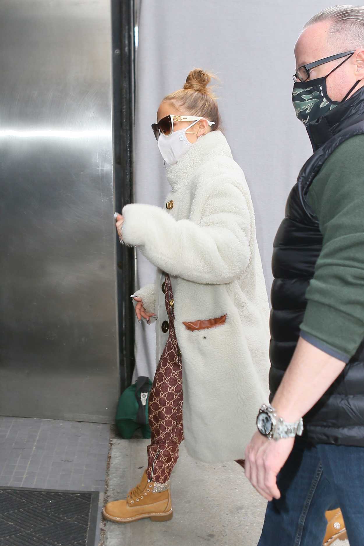 Jennifer Lopez in a White Fur Coat Heads into the Studio in New York 12