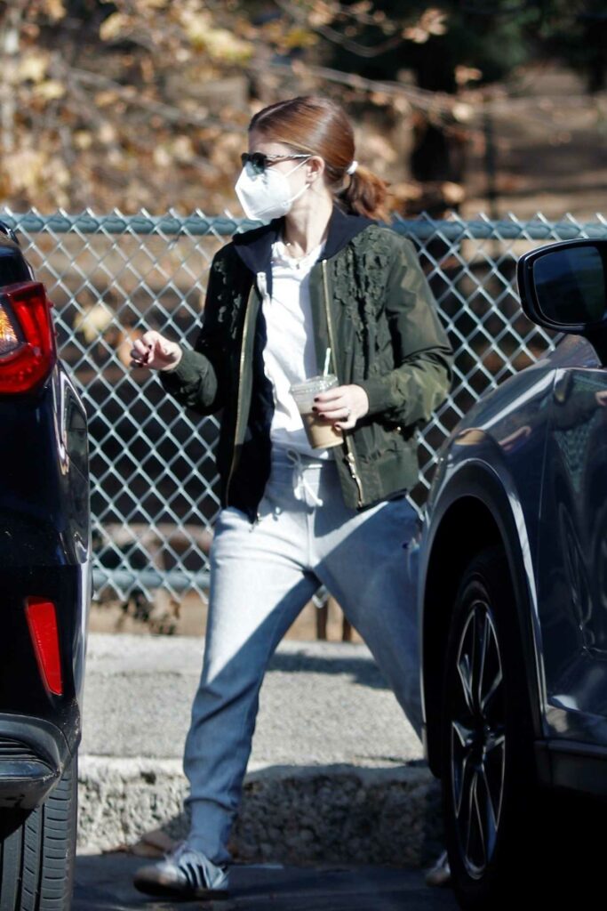 Kate Mara in an Olive Bomber Jacket