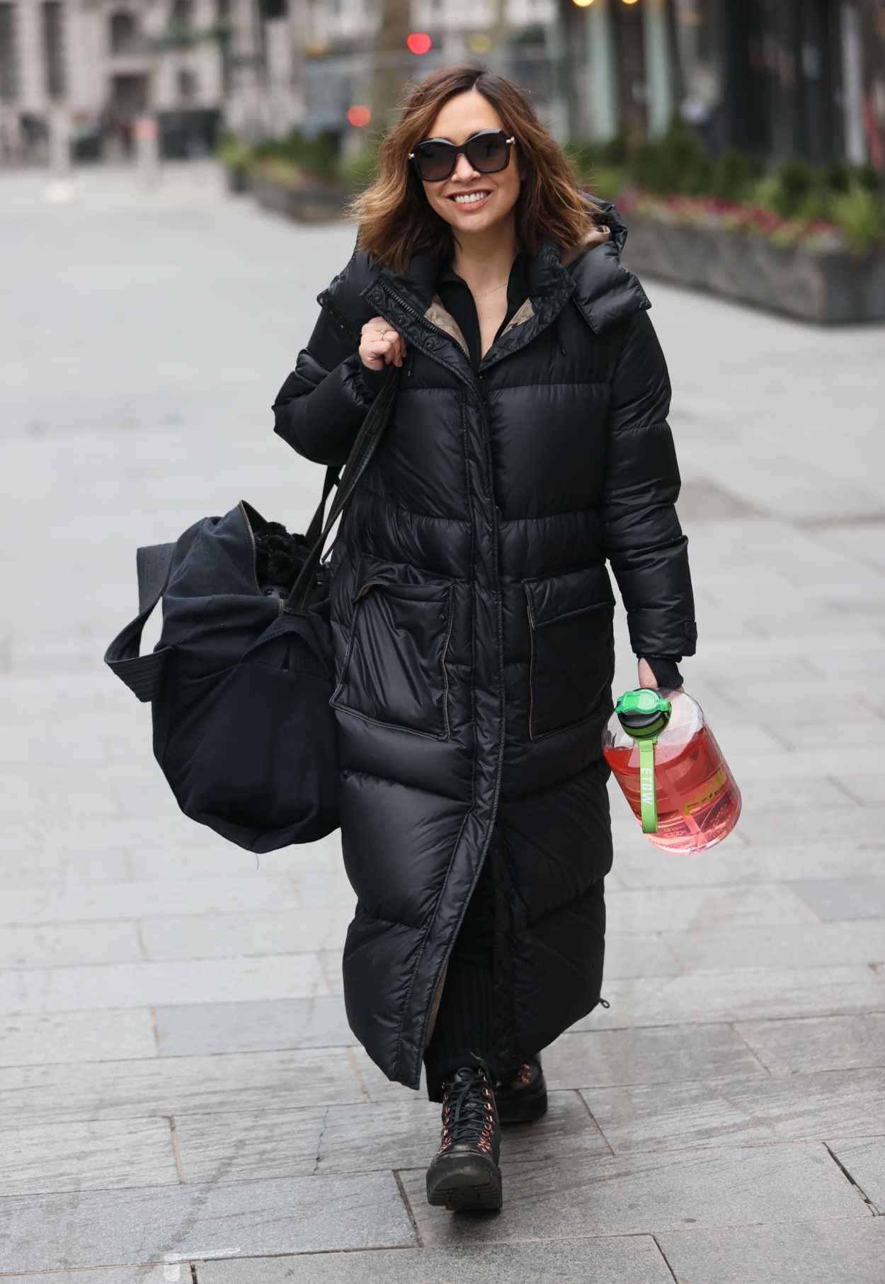 Myleene Klass in a Black Puffer Coat Arrives at the Smooth Radio ...