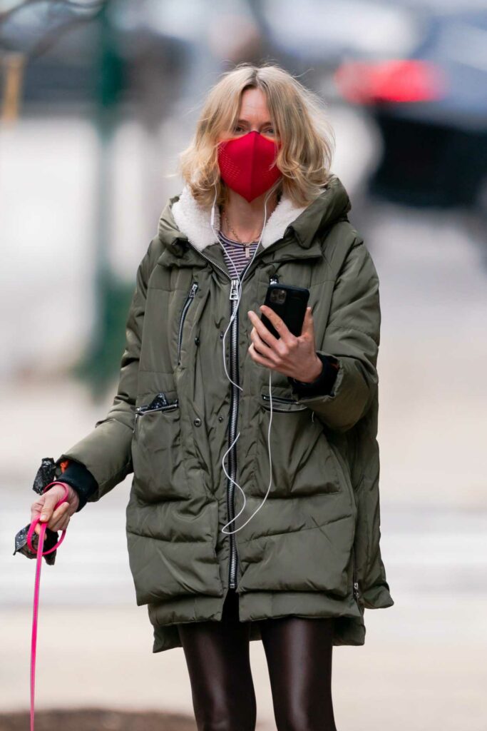 Naomi Watts in a Red Protective Mask