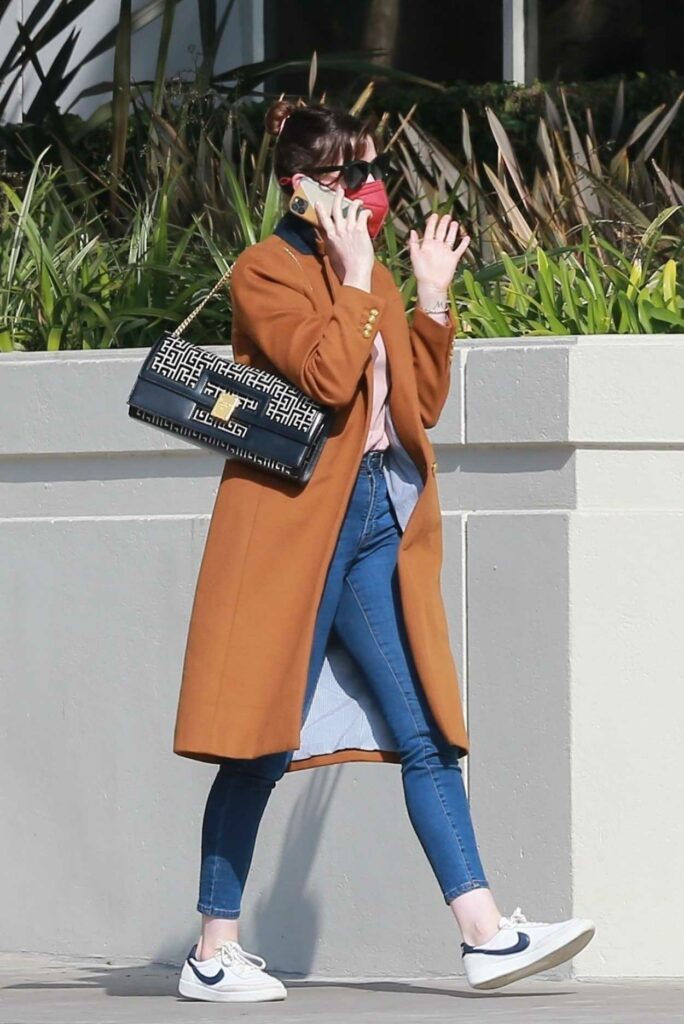 Anne Hathaway in a Tan Coat