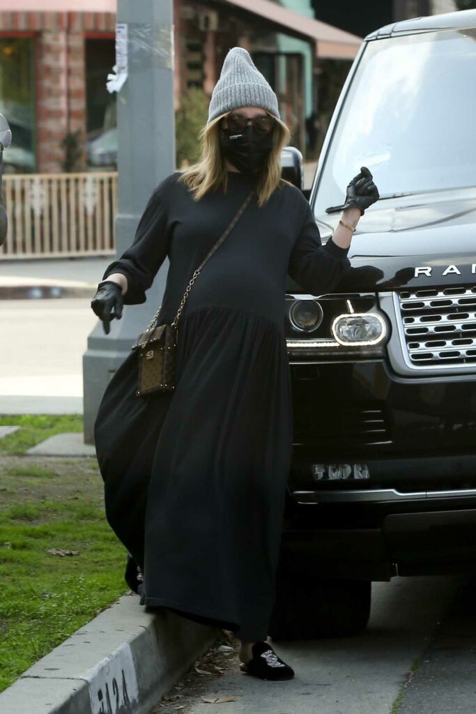 Ashley Tisdale in a Black Dress