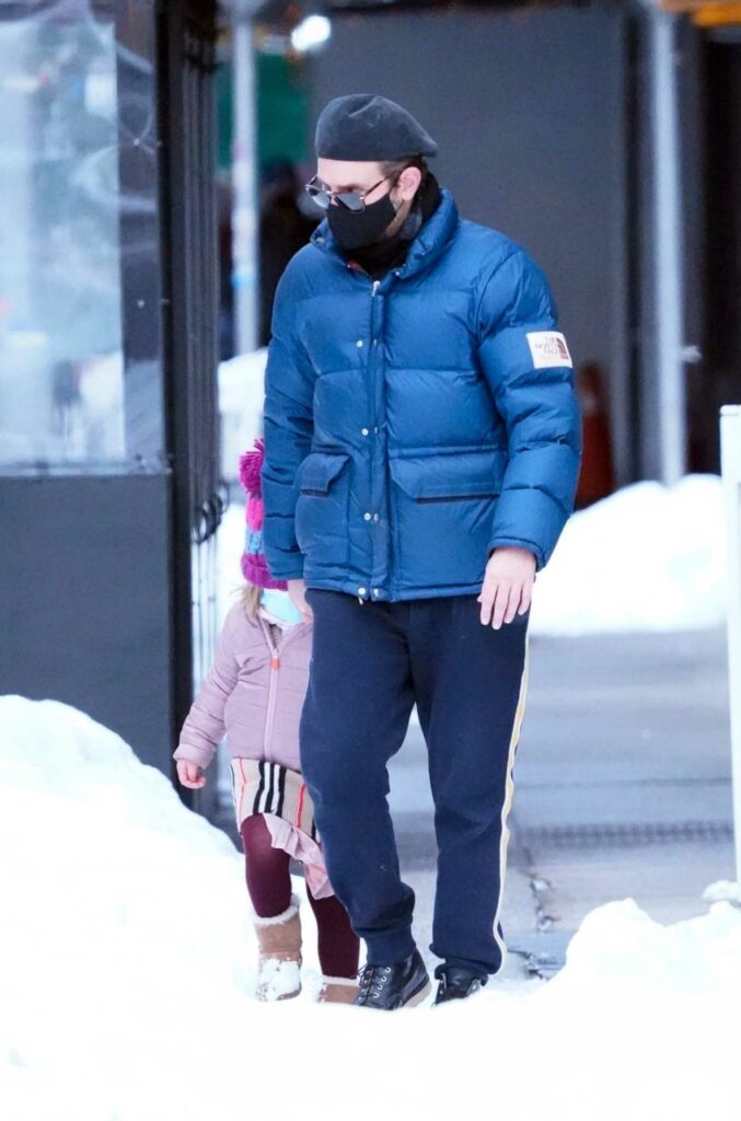 Bradley Cooper in a Blue Puffer Jacket
