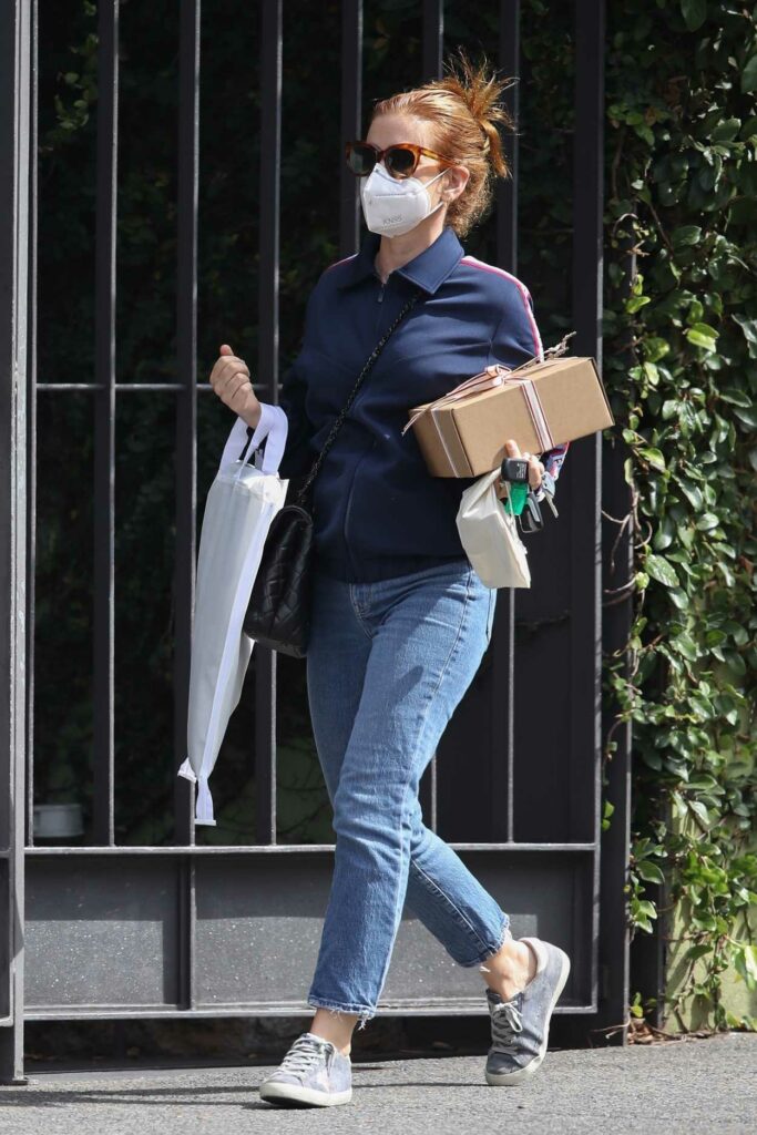 Isla Fisher in a Protective Mask
