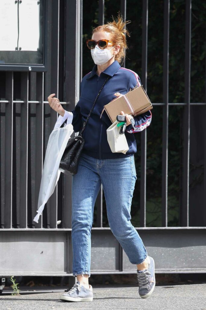 Isla Fisher in a Protective Mask
