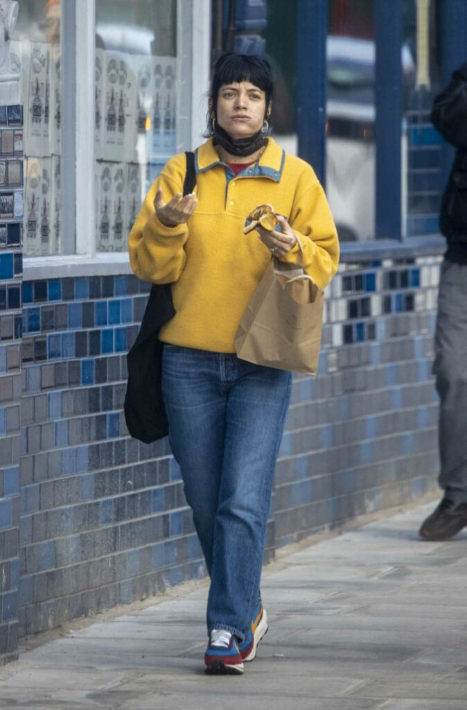 Lily Allen in a Yellow Sweatshirt