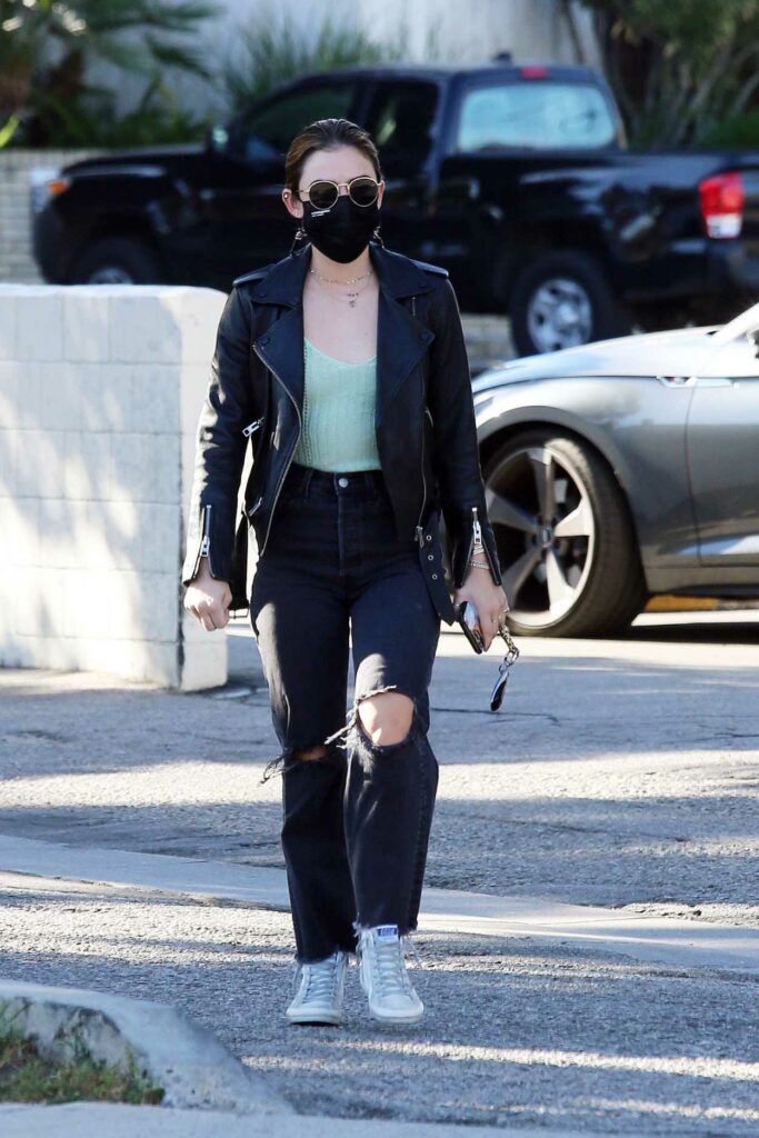 Lucy Hale in a Black Leather Jacket
