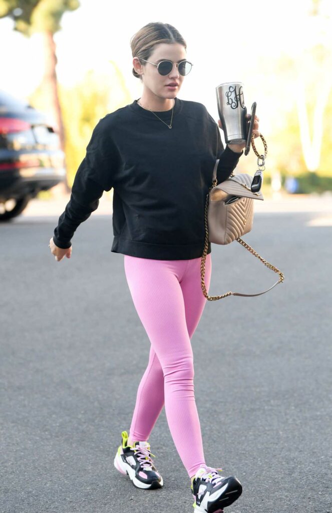 Lucy Hale in a Pink Leggings