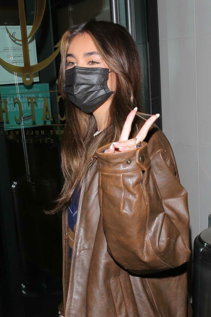 Madison Beer in a Brown Leather Jacket