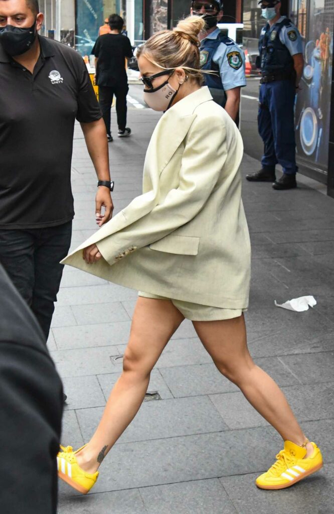 Rita Ora in a Yellow Sneakers