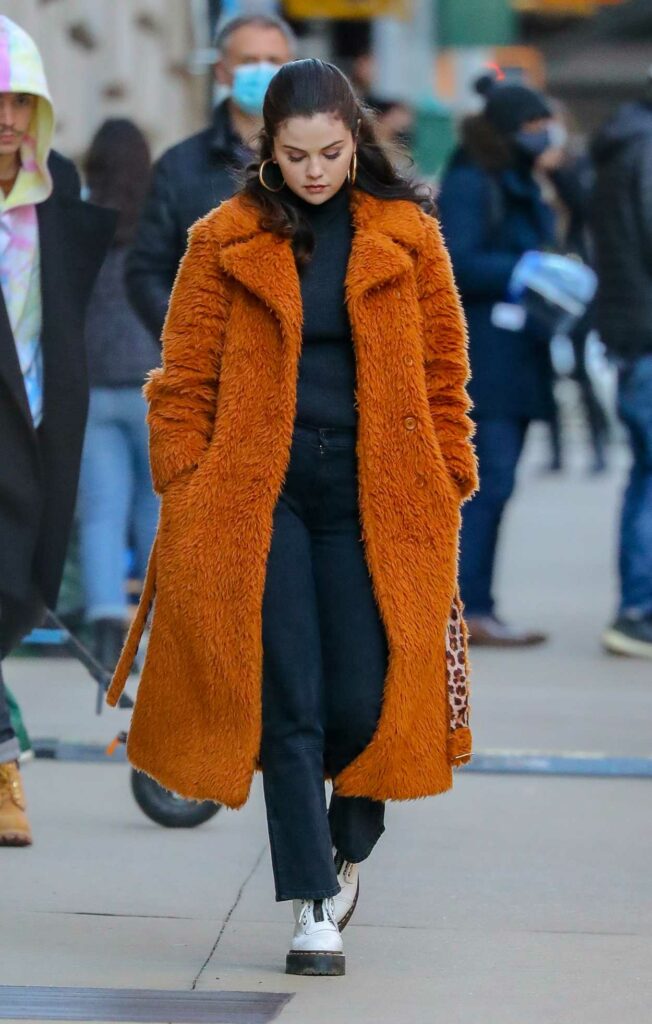 Selena Gomez in an Orange Fur Coat