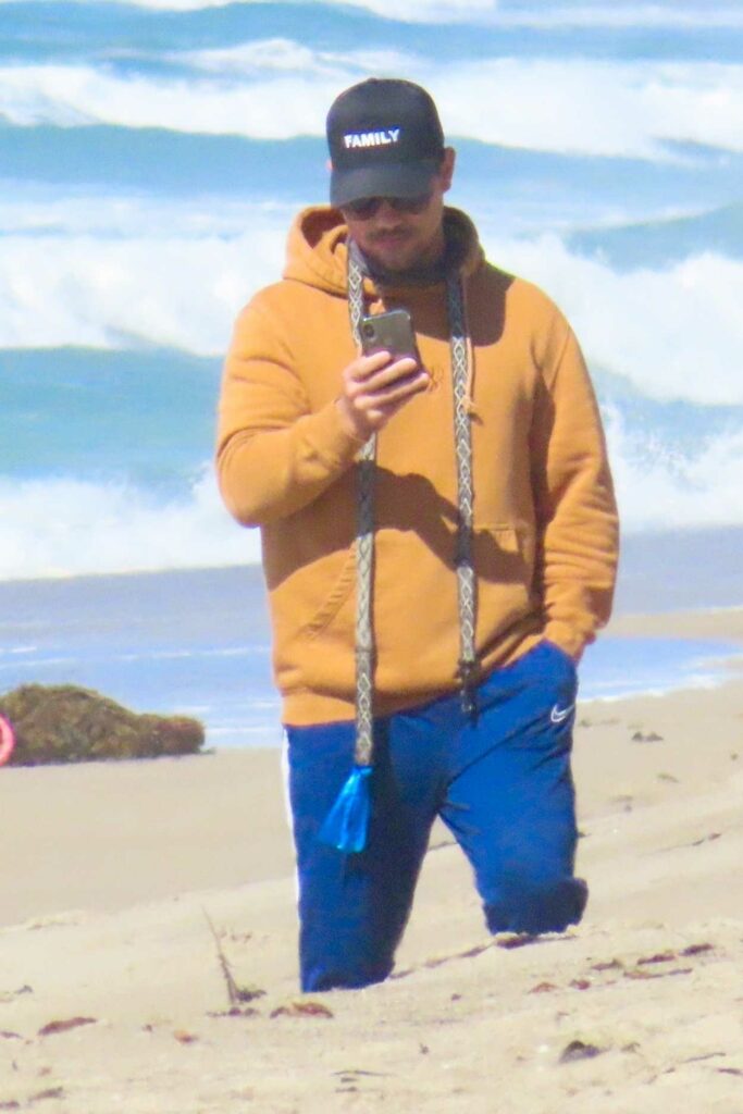 Taylor Lautner in a Yellow Hoodie