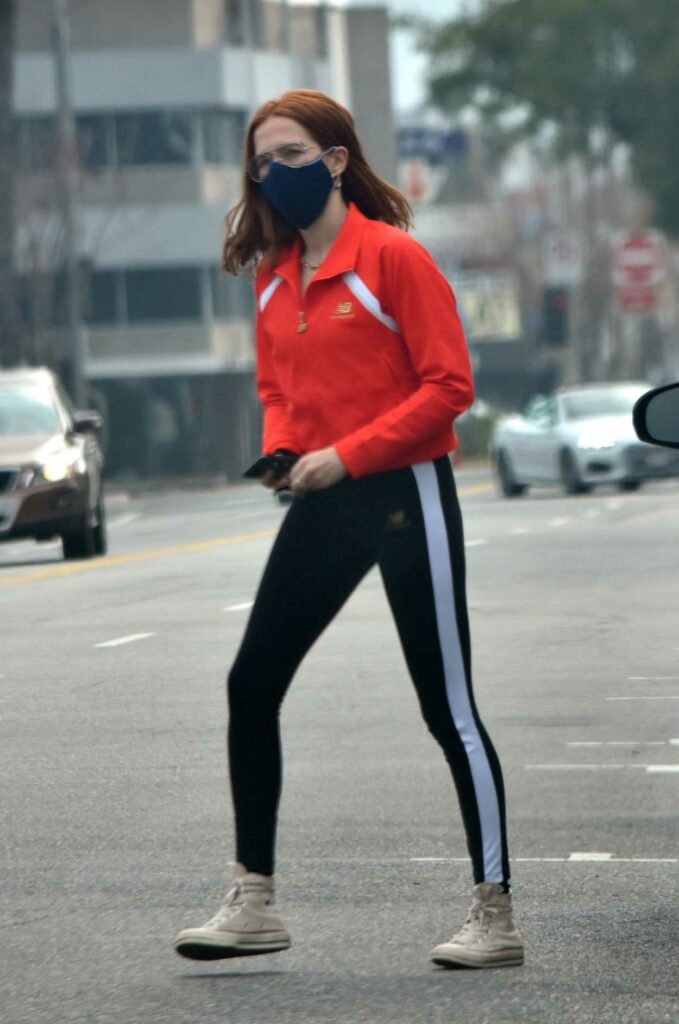 Zoey Deutch in a Red Track Jacket