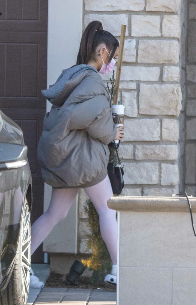 Ariana Grande in a Grey Puffer Jacket