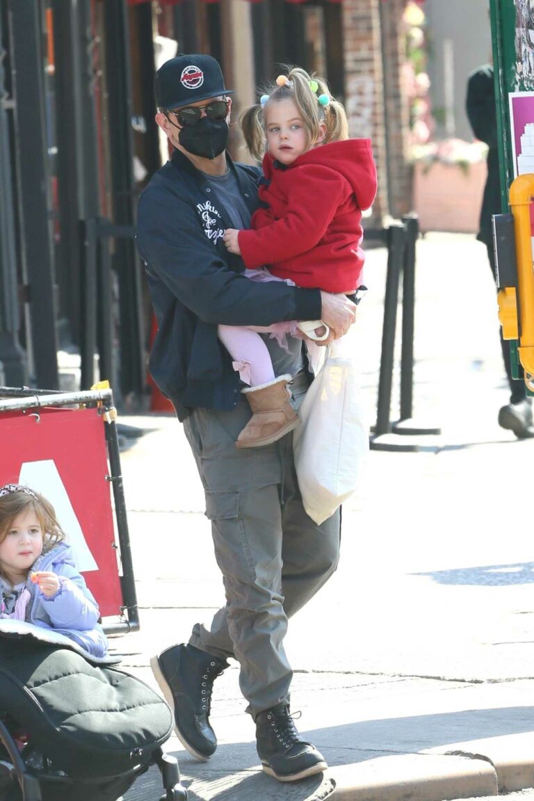 Bradley Cooper in a Black Cap Picks Up His Daughter Lea from School in