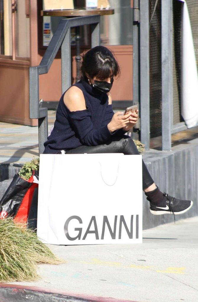 Camila Cabello in a Black Sneakers
