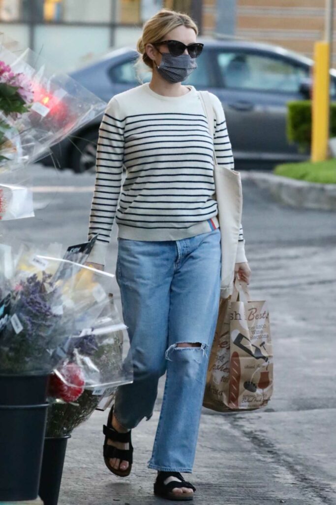 Emma Roberts in a Blue Ripped Jeans