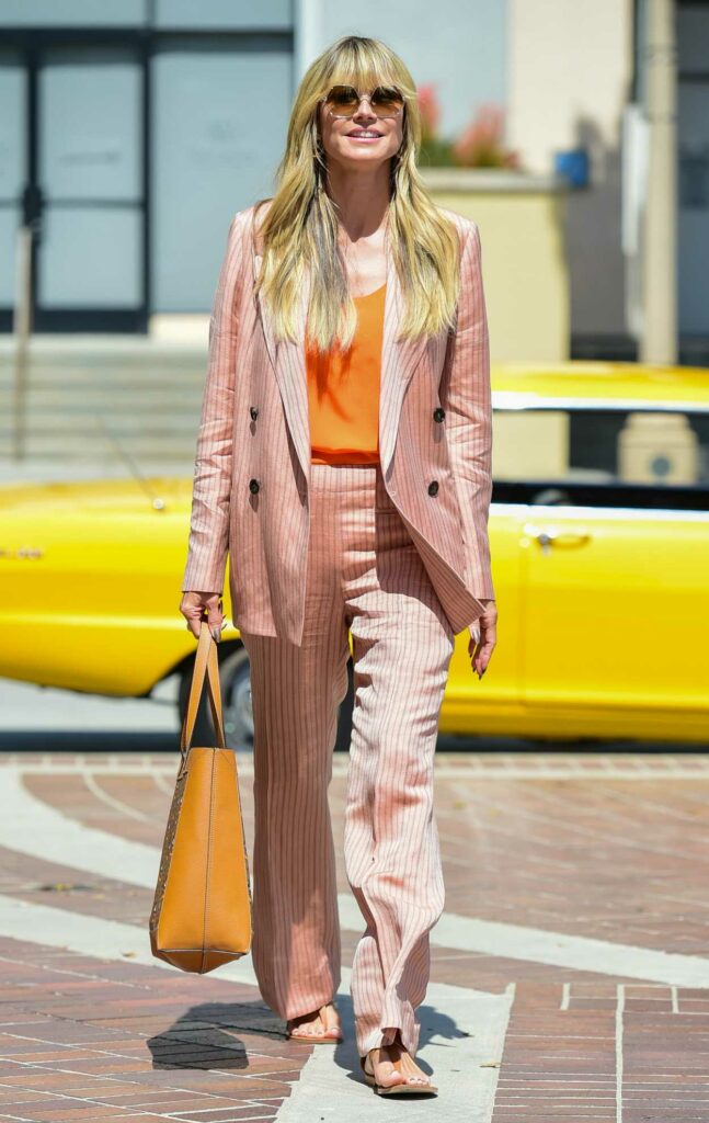 Heidi Klum in a Striped Suit