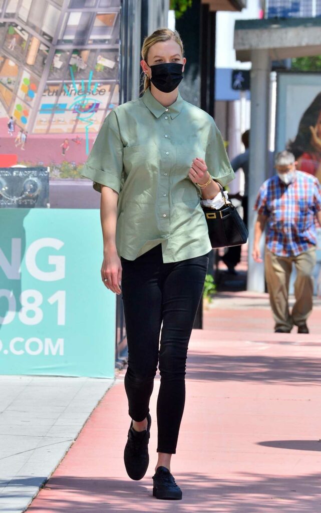 Karlie Kloss in an Olive Shirt