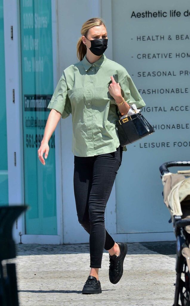 Karlie Kloss in an Olive Shirt