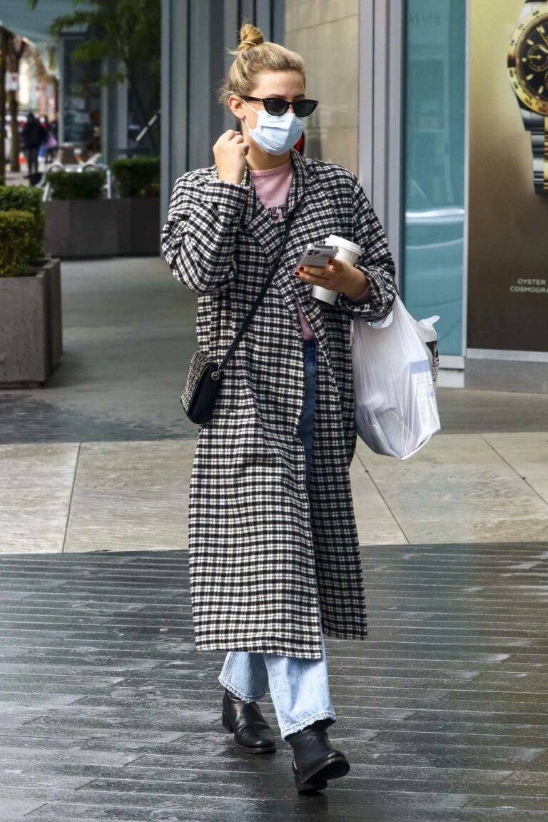 Lili Reinhart in a Grey Plaid Coat Steps Out on a Coffee Run in
