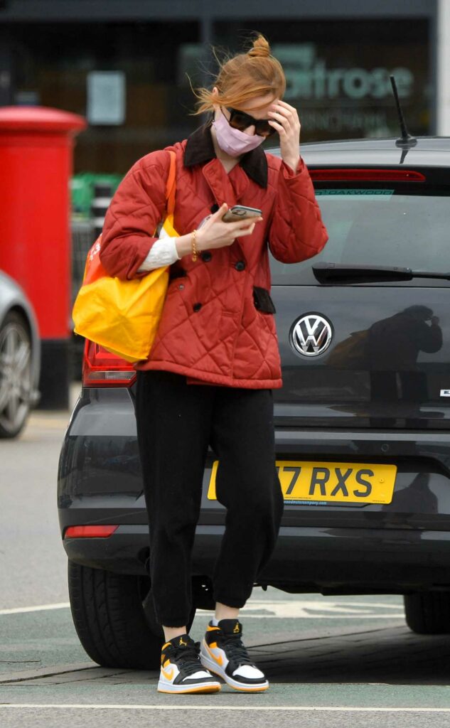 Phoebe Dynevor in a Red Jacket