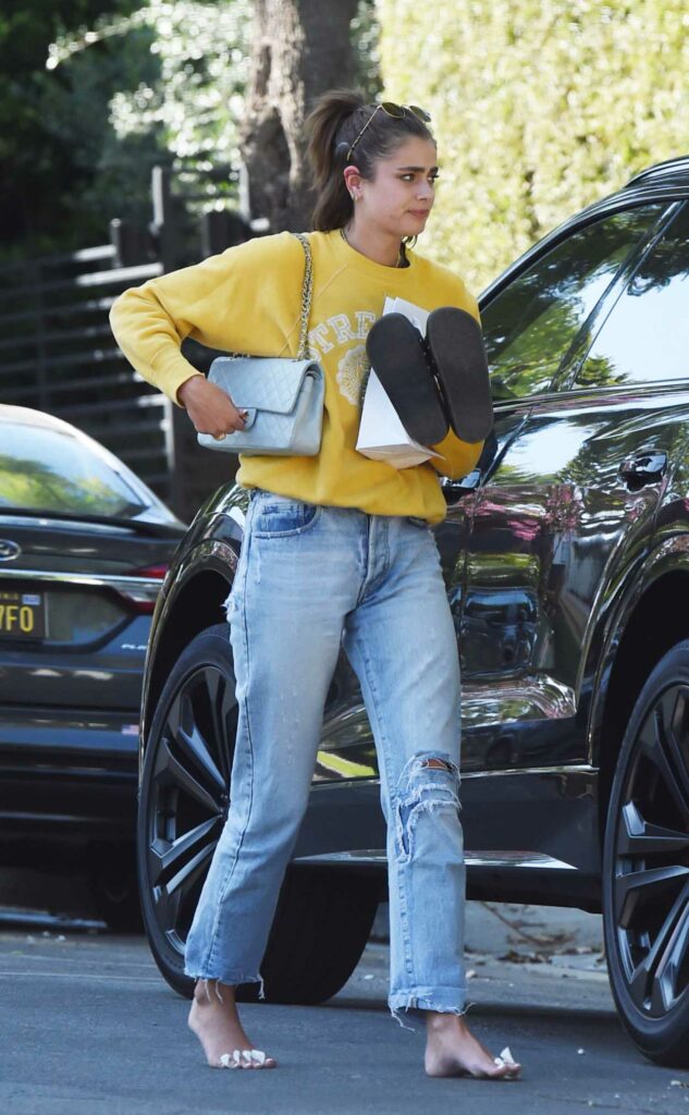 Taylor Hill in a Yellow Sweatshirt